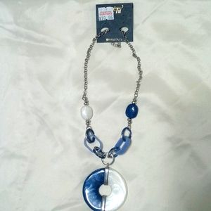 Deep blue and white doughnut medallion necklace